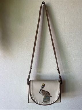 Cream Crossbody Bag with Brown Trim and Hand-Painted Pelican